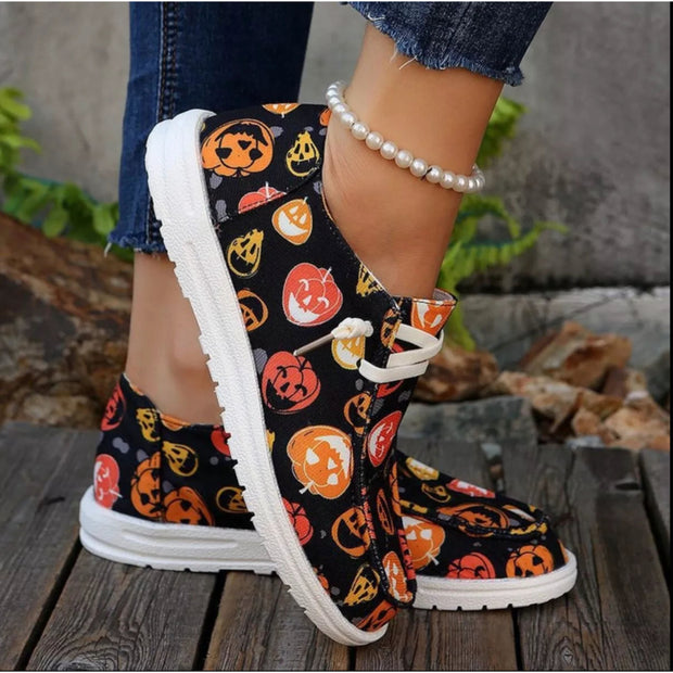 Halloween Pumpkin Print Round Toe Sneakers with colorful pumpkin patterns on comfortable canvas shoes.