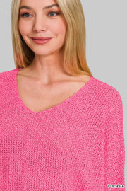 Zenana Dolman Sleeve V-Neck Knit Sweater in vibrant fuchsia, showcasing a relaxed fit and flattering V-neckline.