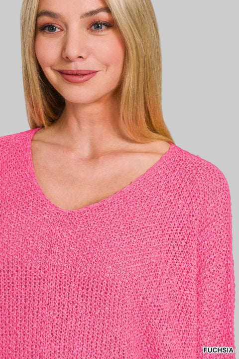 Zenana Dolman Sleeve V-Neck Knit Sweater in vibrant fuchsia, showcasing a relaxed fit and flattering V-neckline.