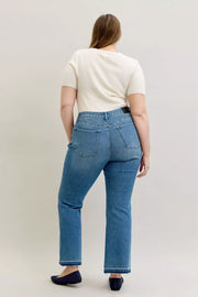 Model showcasing Judy Blue High-Waist Straight Leg Jeans from the back, emphasizing the tummy control feature and stylish fit.