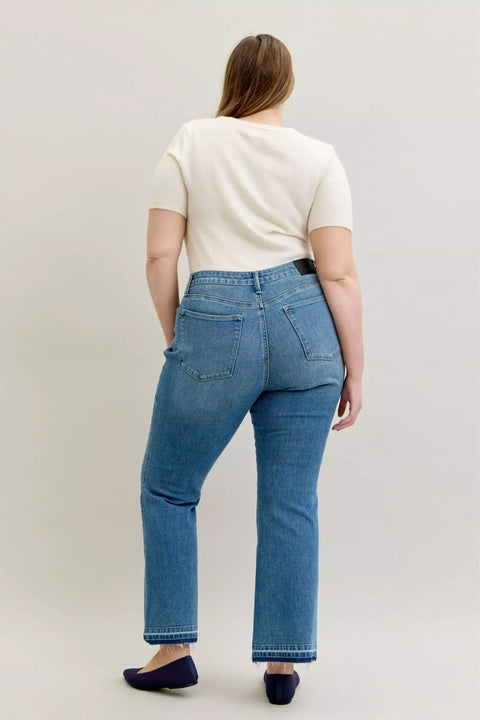 Model showcasing Judy Blue High-Waist Straight Leg Jeans from the back, emphasizing the tummy control feature and stylish fit.