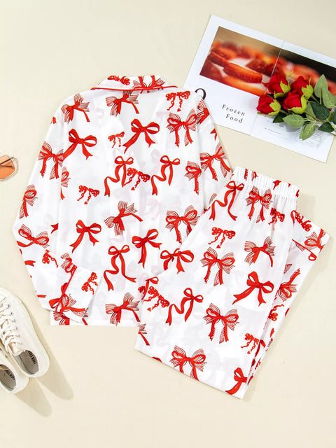 Buttoned Two-Piece Set featuring a holiday design with red bows on a white background, perfect for festive occasions.