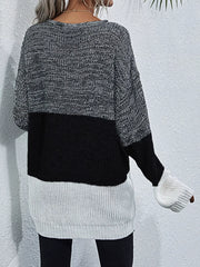 Color Block Round Neck Oversized Sweater featuring a cozy, oversized fit and stylish black, gray, and white color blocking.
