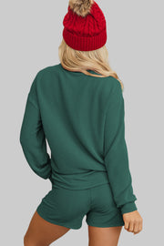 Evergreen MERRY Corded Lounge Set featuring cozy long-sleeve top and relaxed-fit shorts, perfect for holiday lounging.