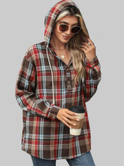 Model wearing a Plaid Hooded Drawstring Top, holding a coffee cup, showcasing a cozy and casual style.