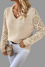 V-Neck Crochet Sleeve Sweater in beige with intricate crochet sleeves, perfect for adding elegance to a casual outfit.