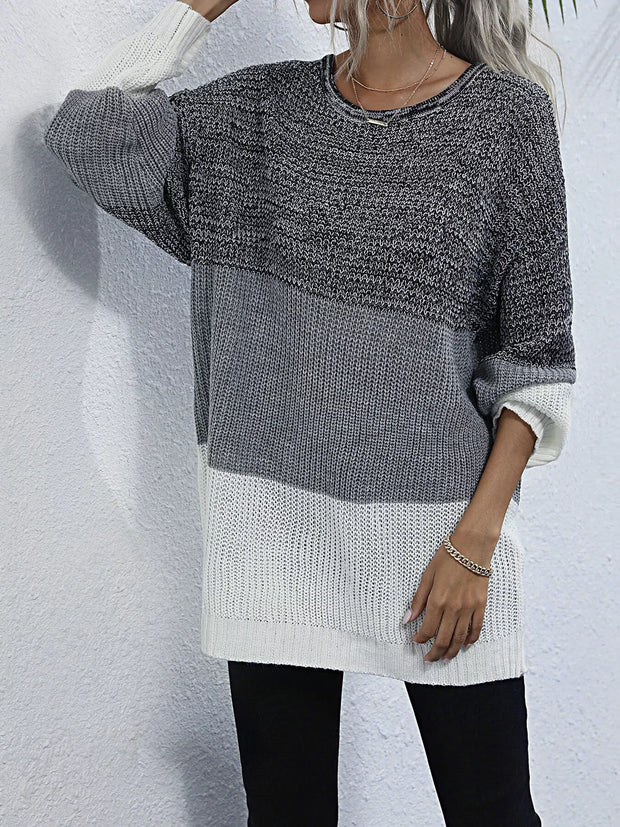 Color Block Round Neck Oversized Sweater featuring a relaxed fit and trendy color block design in gray and white.