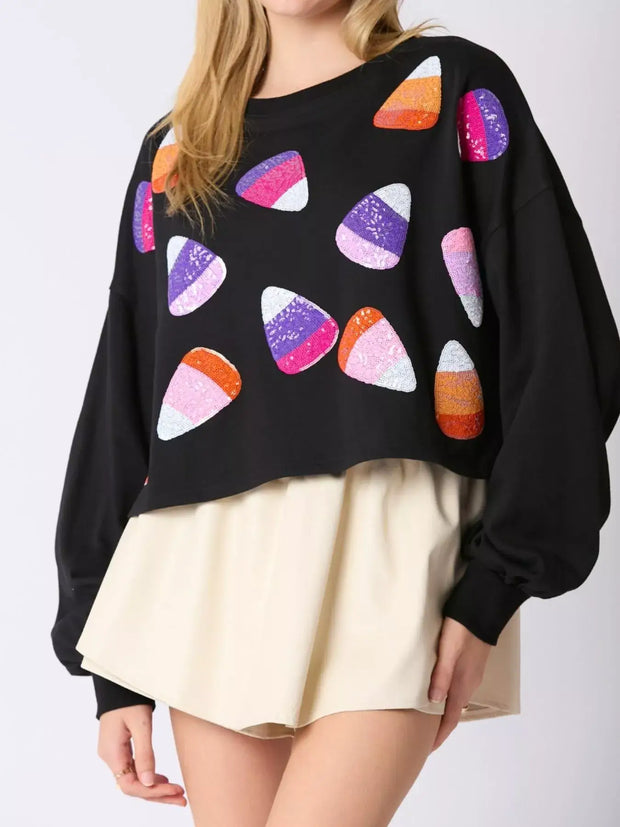 Halloween Candy Sequin Long-Sleeve Sweatshirt with colorful sequin candy design.