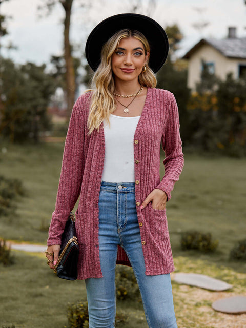 Ribbed Button-Up Cardigan with Pockets worn by a model outdoors, featuring a casual look with V-neck and long sleeves.