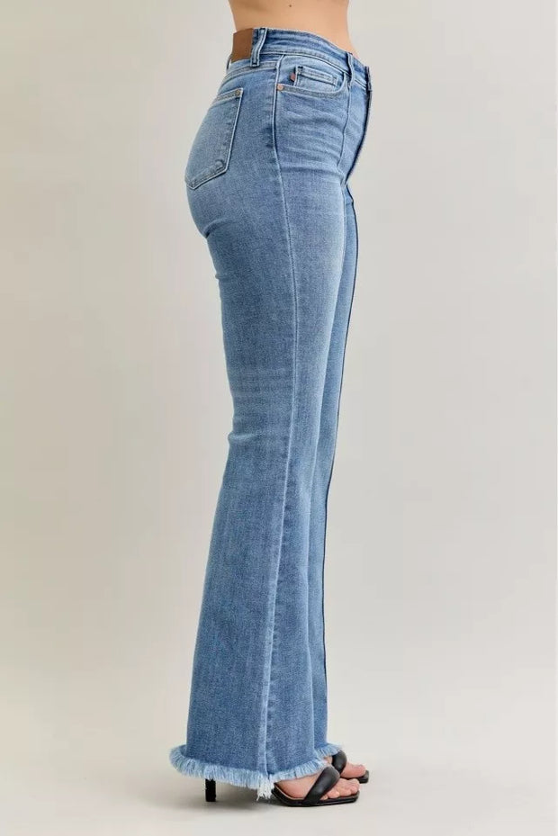 Judy Blue High Waist Flare Fray Hem Jeans with Pintuck Detail showcased in a side view, highlighting the fit and frayed hem.