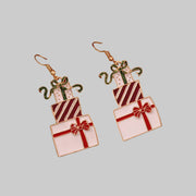Stacked Gift Box Christmas Earrings featuring colorful stacked present charms with bows and glitter accents.
