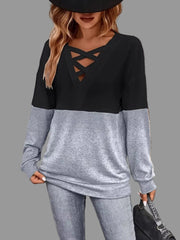 Crisscross V-Neck Color Block Top in black and gray, featuring a trendy neckline and casual style for everyday wear.