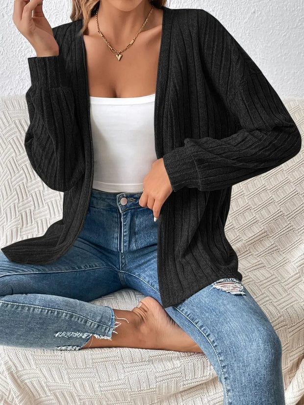Cozy Open-Front Long Sleeve Cardigan worn by a woman with a relaxed fit, styled for casual comfort.