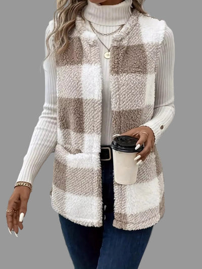 Plaid Sherpa Vest Coat in beige and white, worn over a turtleneck, perfect for stylish layering.