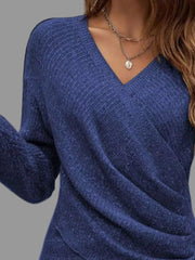 Surplice Long Sleeve Knit Top featuring a ribbed wrap neckline and relaxed fit in a blue color on a model.