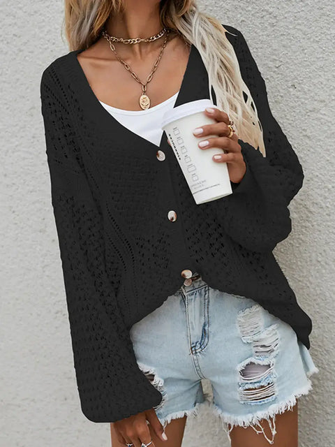 Openwork Button Front Cardigan styled with shorts and a drink, showcasing its chic openwork design.