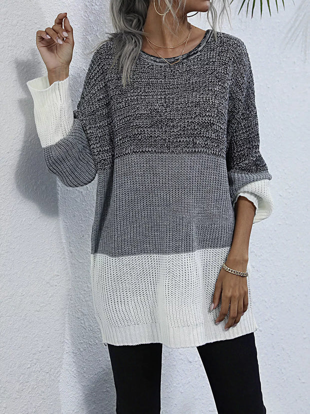 Color Block Round Neck Oversized Sweater in gray and white, showcasing a cozy yet chic design with a relaxed fit.