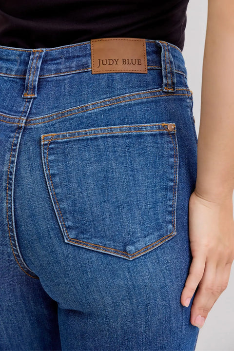 Close-up of Judy Blue High-Waist Straight Leg Jeans showcasing tummy control and comfortable fit.
