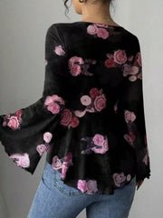 Floral Tie-Front Blouse featuring a back view with fluttery flare sleeves and a black floral print design.