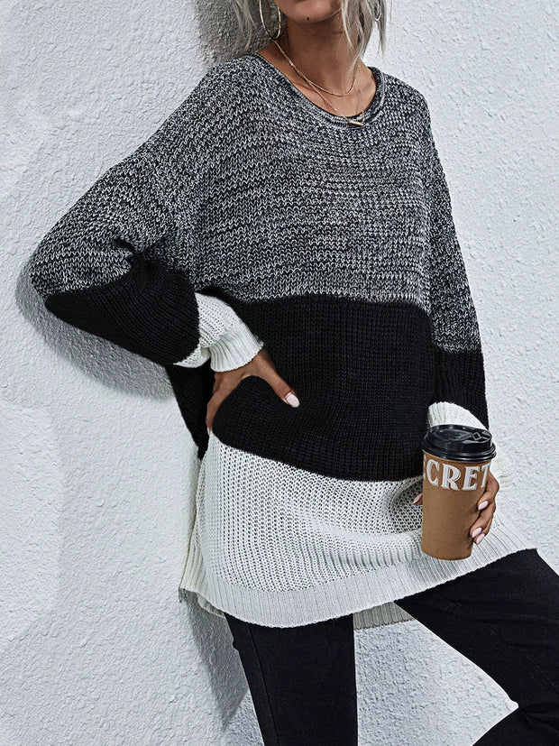 Color Block Round Neck Oversized Sweater displayed with a coffee cup in a cozy, casual outfit.