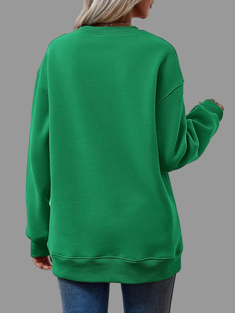 Back view of a woman wearing a green Letter Graphic Round Neck Sweatshirt, showcasing the relaxed fit and comfort.