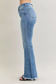Judy Blue High Waist Flare Fray Hem Jeans with Pintuck Detail showcased from the side, highlighting the flare leg and frayed hem.