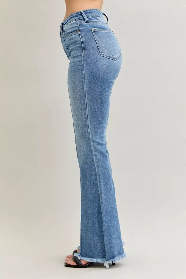 Judy Blue High Waist Flare Fray Hem Jeans with Pintuck Detail showcased from the side, highlighting the flare leg and frayed hem.