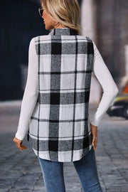 Plaid Button-Up Vest Coat in black and white plaid pattern, styled over a white long-sleeve top, perfect for layering.
