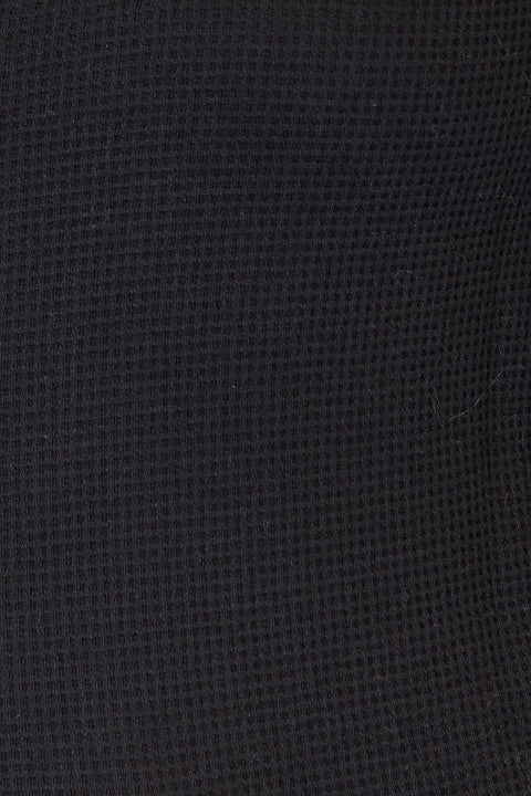 Close-up view of the textured fabric of the Mandy Plaid Collared Jacket in black.