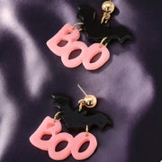 Halloween Bat “Boo” Dangle Earrings – Spooky Cute Statement Jewelry featuring black bat and pink 'Boo' charms.