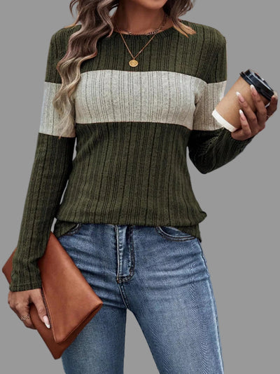 Woman wearing a Color Block Round Neck T-Shirt in olive green and cream, holding a coffee cup and a brown clutch.