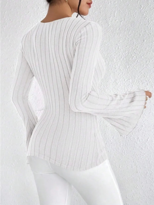 Ribbed Flare Sleeve Top – Slim Fit Knit showcasing a slim fit with flared sleeves and ribbed texture from the back.