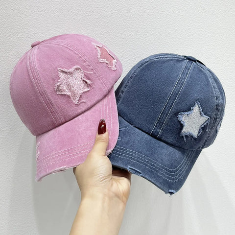 Star Embroidered Baseball Cap in pink and blue, showcasing distressed star stitching for a trendy look.
