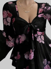 Floral Tie-Front Blouse featuring a romantic design with pink flowers and elegant flutter sleeves, perfect for feminine style.