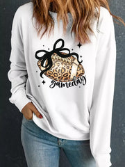 Game Day Leopard Rugby Graphic Crewneck Sweatshirt featuring a stylish graphic of a leopard print rugby ball.